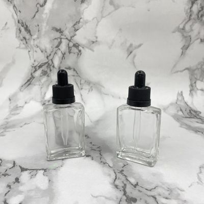 Косметика квадрата 30ml стеклянная разливает крышку по бутылкам капельницы Childproof для масла ухода за волосами