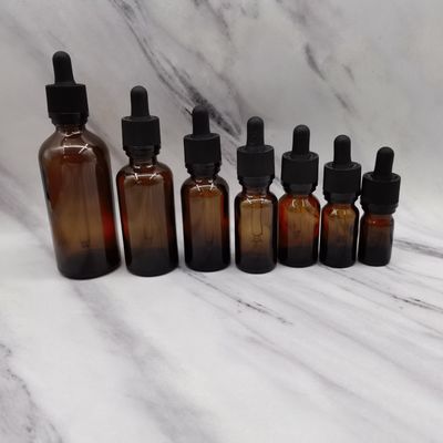 янтарная стеклянная косметика 100ml разливает закрытие по бутылкам храповика капельницы для защиты детей